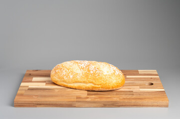 Freshly Baked Bread on Wooden Board