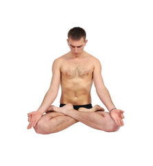 Focused caucasian man practicing yoga