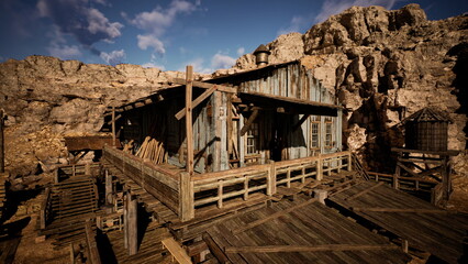 Fototapeta premium This rustic wooden structure stands on a wooden platform amidst rocky terrain. Surrounded by cliffs, it offers a glimpse into a bygone era and showcases natural beauty under clear skies.