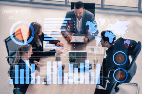 A dynamic business meeting featuring professionals discussing data displayed on a digital dashboard, showcasing charts and graphs in a modern office environment. Impute - Powered by Adobe