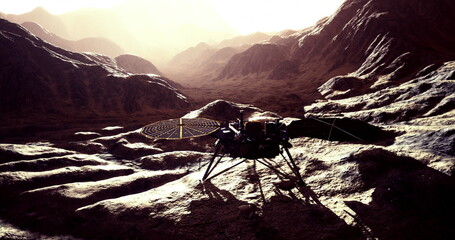 InSight lander is stationed on the rocky terrain of Mars, casting long shadows as the evening light highlights the surrounding rugged landscape and distant mountains. © icetray