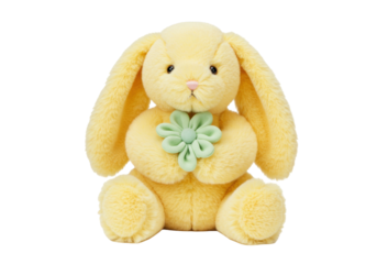 Adorable yellow plush bunny with green flower isolated, soft toy for kids and Easter decoration PNG