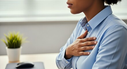 Professional woman practicing self-compassion for workplace stress management.
