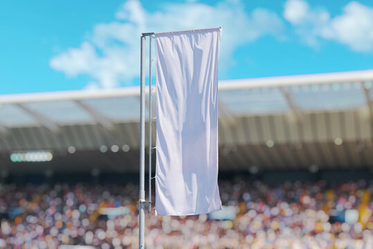 White vertical flag waving on pole at sports stadium, blank template for event promotion, fan zone or peace symbolism.