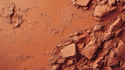 Unglazed clay surface natural terracotta texture with rough weathered patterns and cracks photographed from above displaying authentic earthy reddish brown material