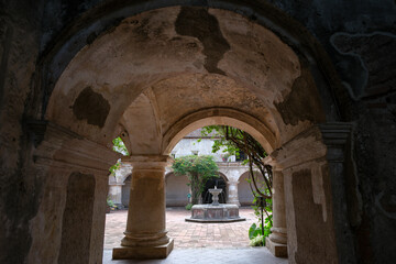 Fototapeta premium Antigua Guatemala, Guatemala - August 9, 2025: Convent of the Capuchins and Church of Our Lady of Zaragoza in Antigua Guatemala, Sacatepequez, Guatemala.