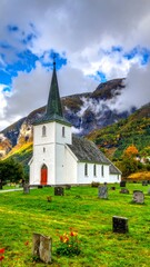 Fototapeta premium Norwegian Church in Scenic Landscape.