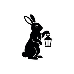 Black silhouette of a rabbit holding a lantern in its paw, facing left bunny hare