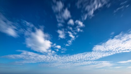 Fototapeta premium White Spreading Blurred Clouds Move Across The Sky In The Morning