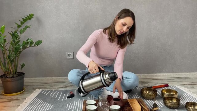 Woman enjoy tea ceremony at home and meditative atmosphere