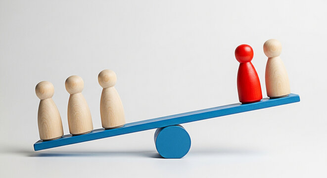 Wooden figures on a seesaw illustrate balance of power and influence in a business environment