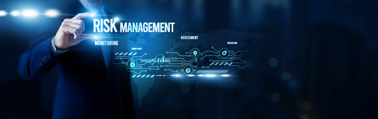 Businessman hold word Risk Management, enterprise risk assessment tools, compliance monitoring systems, fraud detection platforms, corporate protection strategies and global network.