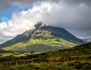 Mountain peak emerging from clouds