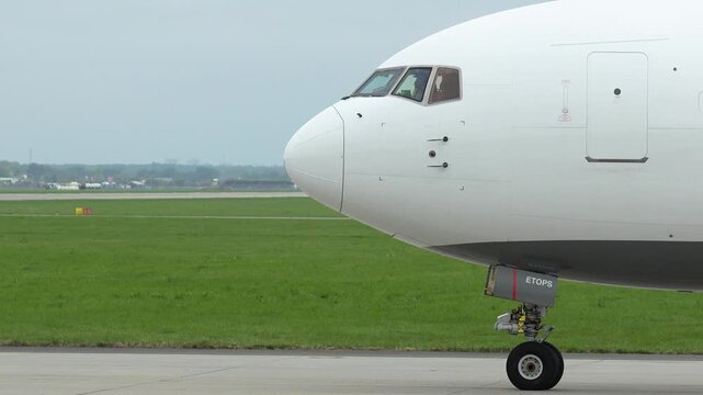 Preparing for a safe takeoff as the plane readies on the tarmac