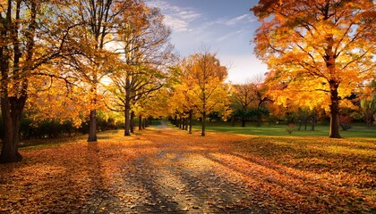 Naklejka premium Autumnal Parkland Vibrant Foliage Golden Leaves Serene Landscape