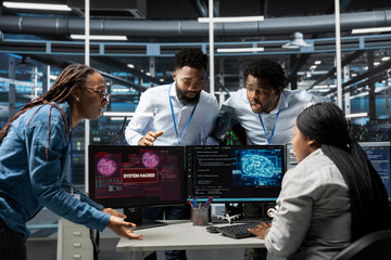 Data center cybersecurity division coworkers scared by security breach. Worried IT staff members in data center panicking, trying to protect servers from hacker attack stealing sensitive information