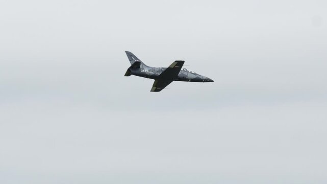 Elegant maneuvering of Aero L-39 Skyfox during an aerial display show