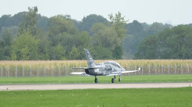 Experience the elegance of Aero L-39 Skyfox during takeoff at a rural airfield