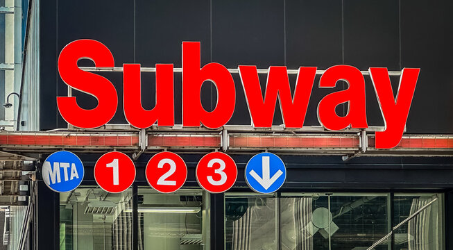 New York City, USA, May 1st 2024, view of a subway sign for the NYC 1, 2, and 3 subway lines, which are part of the same 7th Avenue line, indicated by the red color on the subway map.