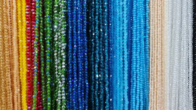 Colorful shiny beads necklaces hanging display