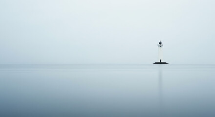 Fototapeta premium Lighthouse on calm water with tranquil atmosphere