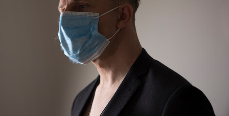 Business Concept - Portrait Handsome Businessman in face mask holding hands with confident face.
