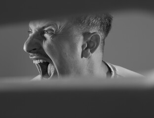 Screaming, portrait man. Male. Man angry. Stress
