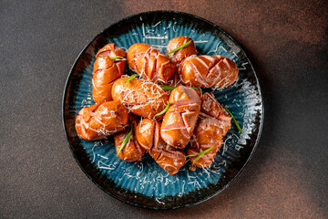 Grilled sausages with cheese top view