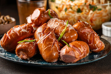 Grilled sausages with cheese and garnish