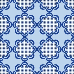 Blue white seamless background with flowers.
Abstract, repeating regular pattern for print.
Graphic design with regular shapes.