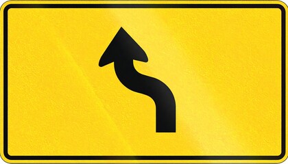 Yellow traffic sign with black curve arrow