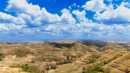 During the peak of summer 2025, Sumba's grass browns and withers, and its savannas are blackened by burn