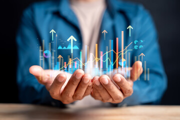 Financial technology and investment growth concept. Digital graphs and charts with rising arrows,...