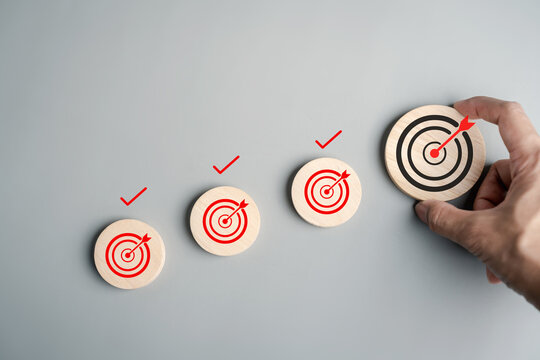 Goal achievement and milestone with targets from small to large, strategic planning, growth steps, productivity, business success, and accomplishment.
