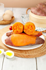 Fresh Sweet Potatoes with Orange Flesh Detail on Wooden Cutting Board Kitchen Food Photography