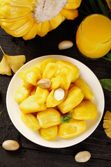 Fresh Hainan Pineapple Chunks with Tropical Nectar Juice Display on Rustic Wooden Table