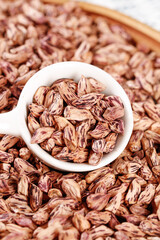 Fresh Pinto Beans in Spoon with Basket of Dried Legumes - Healthy Protein Food Ingredient