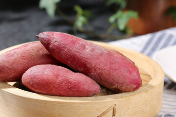 Fresh Red Sweet Potatoes in Wooden Bowl - Healthy Root Vegetables for Cooking