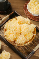 White Dried Fungus Mushrooms in Bamboo Basket Traditional Asian Food Ingredient