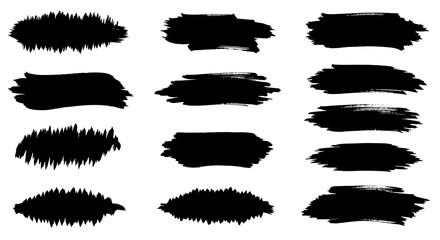 Set of black brush strokes and splatters isolated on a white background