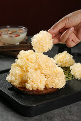 White Gutian Fungus Mushroom Being Served - Traditional Asian Medicinal Food Ingredient
