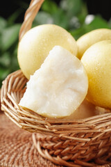 Fresh Hebei Crown Pears in Wicker Basket with Sliced Piece Showing Crisp White Flesh
