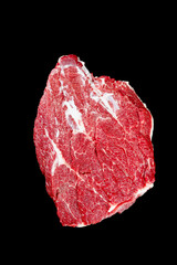 Raw Beef Brisket Steak with Marbling on Black Background - Fresh Butcher Cut Meat