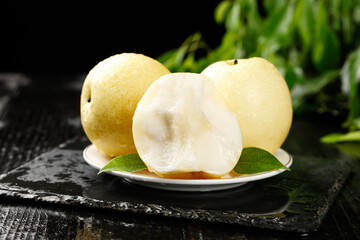 Fresh White Crown Pears from Hebei China on Plate with Slice