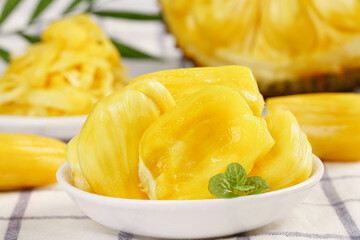 Fresh Thai Pineapple Slices with Golden Honey Flesh in White Bowl
