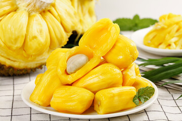 Fresh Vietnamese Honey Pineapple Slices with Golden Yellow Flesh on White Plate