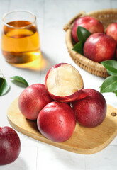 Fresh Red Nectarines with White Pulp on Wooden Board - Healthy Stone Fruit Display