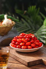 Fresh Cooked Red Crawfish Qianjiang Style Seafood with Garlic on Rustic Wooden Table