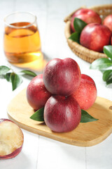 Fresh Red Nectarines on Wooden Board with Juice Glass - Healthy Organic Stone Fruit Still Life