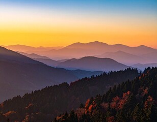 Obraz premium Dusk Landscape with Silhouetted Peaks